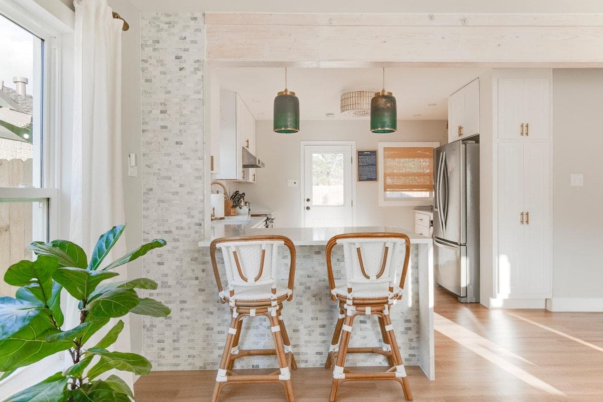 Two Cafe Bistro Rattan Swivel Counter Stools in the kitchen and two more in the closet in the bedrooms.